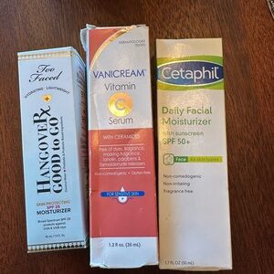 Moisturizer and vitamin c serum new in boxes